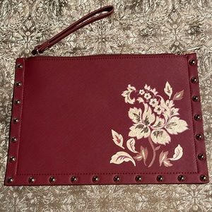 White House Black Market studded burgundy clutch. Fabulous condition.